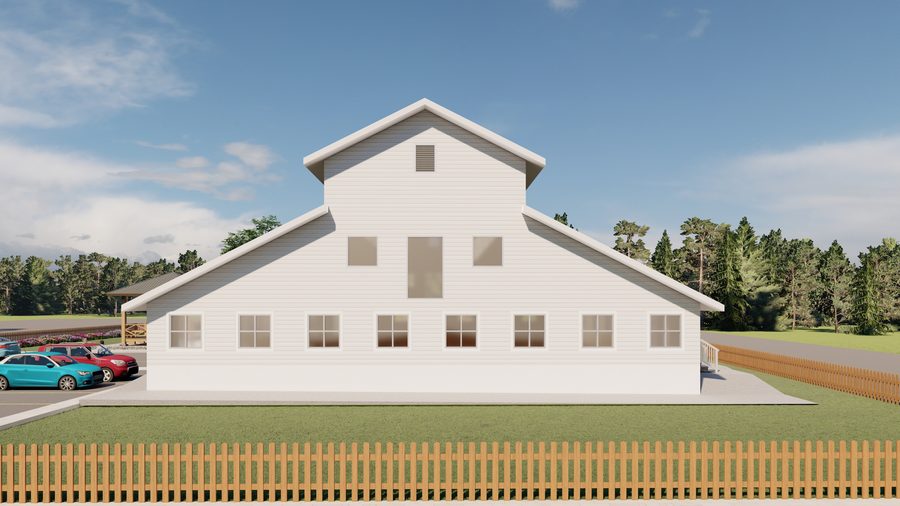 Architectural rendering of The Giving Tree Montessori School: a long barn-form building with clapboard siding, a standing-seam roof, clerestory vents and sliding barn doors, seen wide across the site under an open sky.