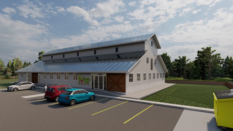 Architectural rendering of The Giving Tree Montessori School: a long barn-form building with clapboard siding, a standing-seam roof, clerestory vents and sliding barn doors, viewed across the lawn toward the pavilion and the parking area.