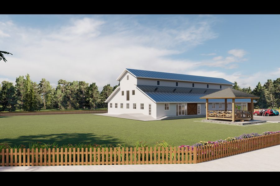 Architectural rendering of The Giving Tree Montessori School: a long barn-form building with clapboard siding, a standing-seam roof, clerestory vents and sliding barn doors, a straight-on gable elevation showing the symmetry of the barn form.